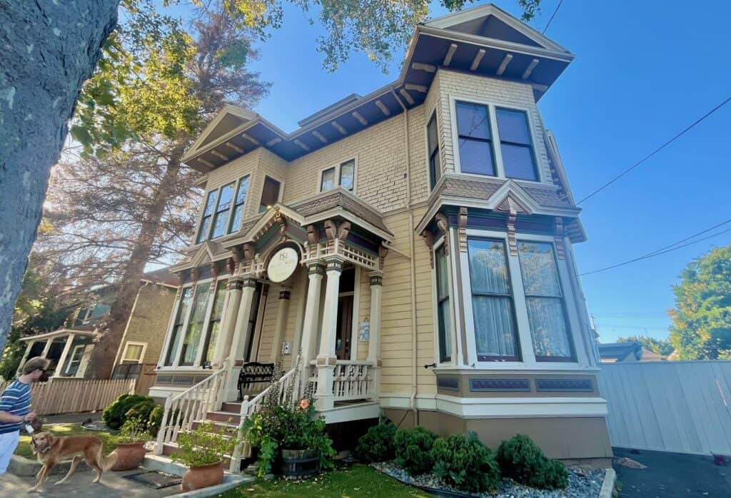 Hotel  Napa Valley, a historic and charming yellow building that is one of the best dog friendly hotels in Napa.