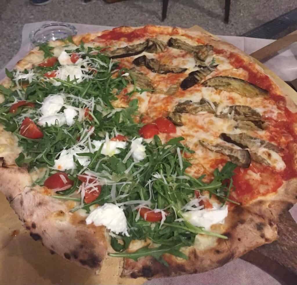 Delicious pizza as shown in the picture should be considered when deciding: is Pisa worth it?